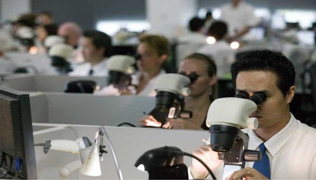 Diamond graders at a GIA laboratory