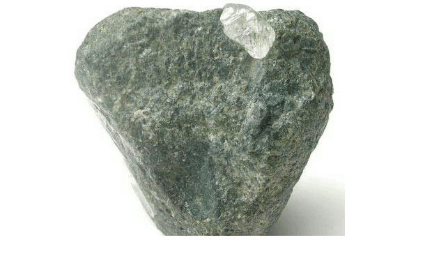 Kimberlite rock with rough diamond