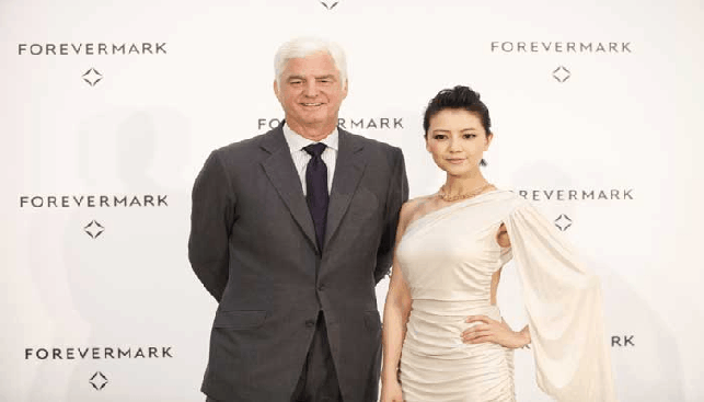 Forevermark CEO Stephen Lussier and Gau Yuan Yuan attend the Shining Light Awards showcase in Beijing