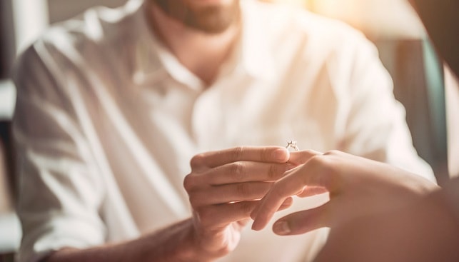 diamond ring engagement couple