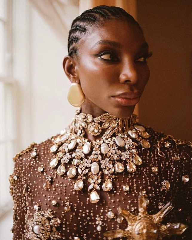 Michaela Coel met diamond jewelry