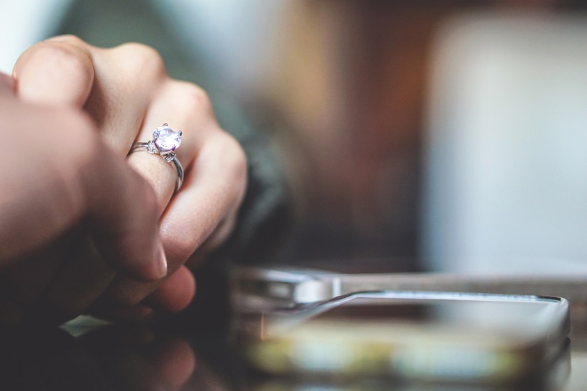 A couple with a diamond ring