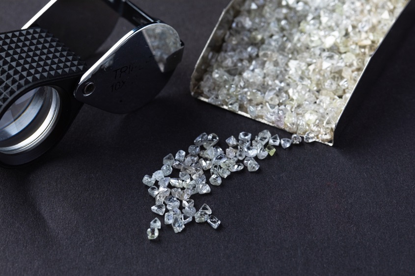 Close,Up,Of,Natural,Rough,Diamond,On,Black,Background.